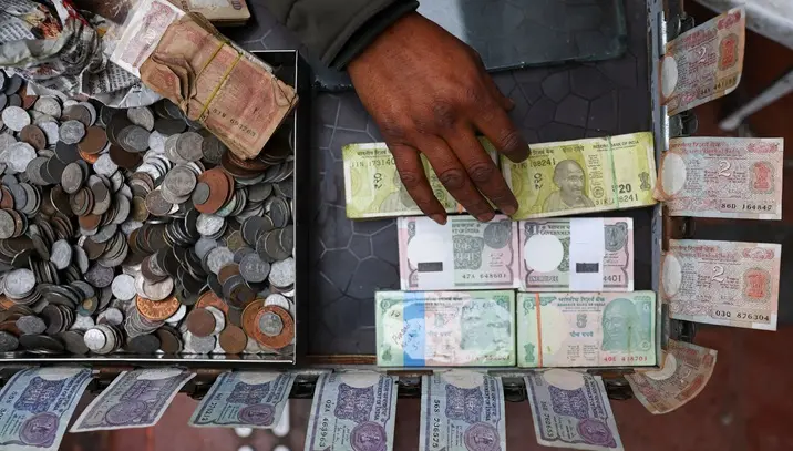 Rupee slips to record low near 96 per dollar as energy risks deepen