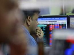 Nifty, Sensex settle lower on weak earnings, growth concerns