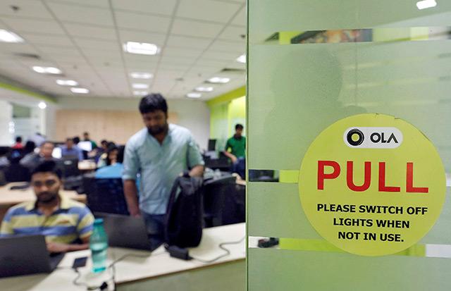 Ola raises $330 mn in fresh round led by SoftBank: Report