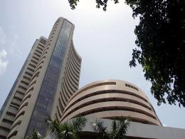 Sensex, Nifty end flat ahead of inflation data, Fed policy later this week