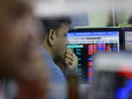 Nifty, Sensex end lower as bank, auto stocks slip