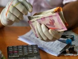 S&P expects India's economy to contract 9% in FY21