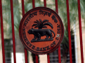 RBI holds rates to further tame prices, raises growth outlook