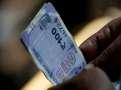 Rupee ends at fresh record low amid fresh equity outflows