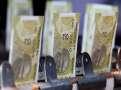Rupee ends at record low, logs fourth consecutive weekly decline