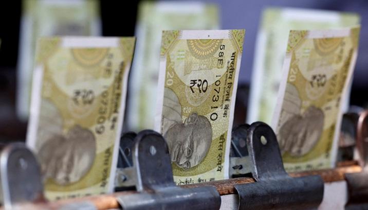 Rupee drops to all-time low on India growth worries, dollar strength