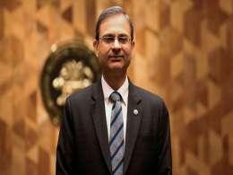 RBI holds interest rates, lifts GDP forecast