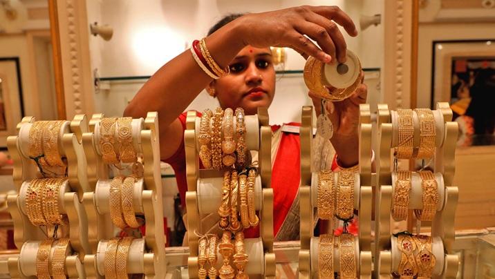 As gold hits records, Indians opt for bars and coins over jewellery